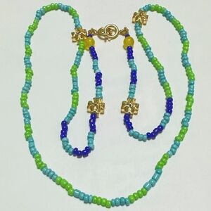 Beaded necklace/ glasses holder by Tory Burch